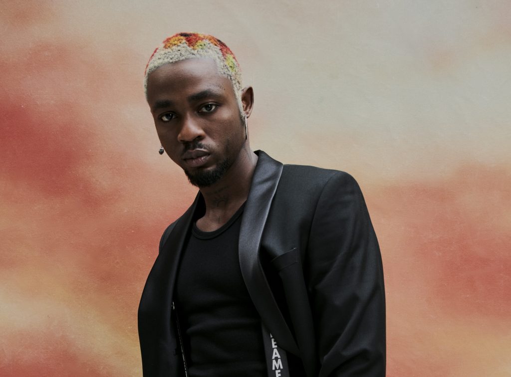 Omah Lay Unveils Cinematic “Artificial Happiness” Video